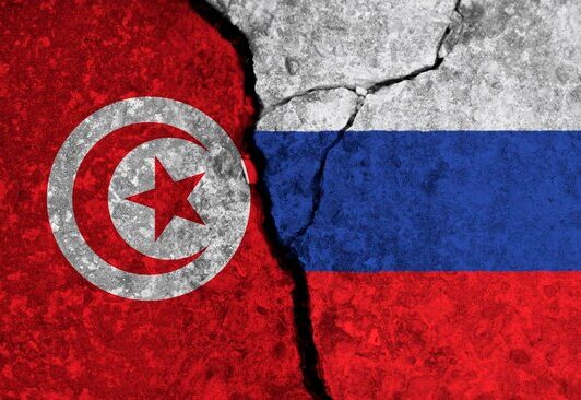 tunisia-russia-national-flags-cracked-concrete-background_601748-14490