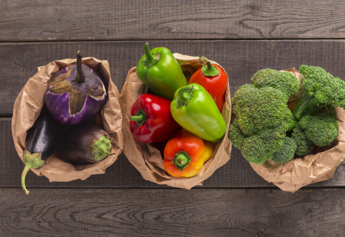 Healthy fresh vegetables in no plastic packages on wood